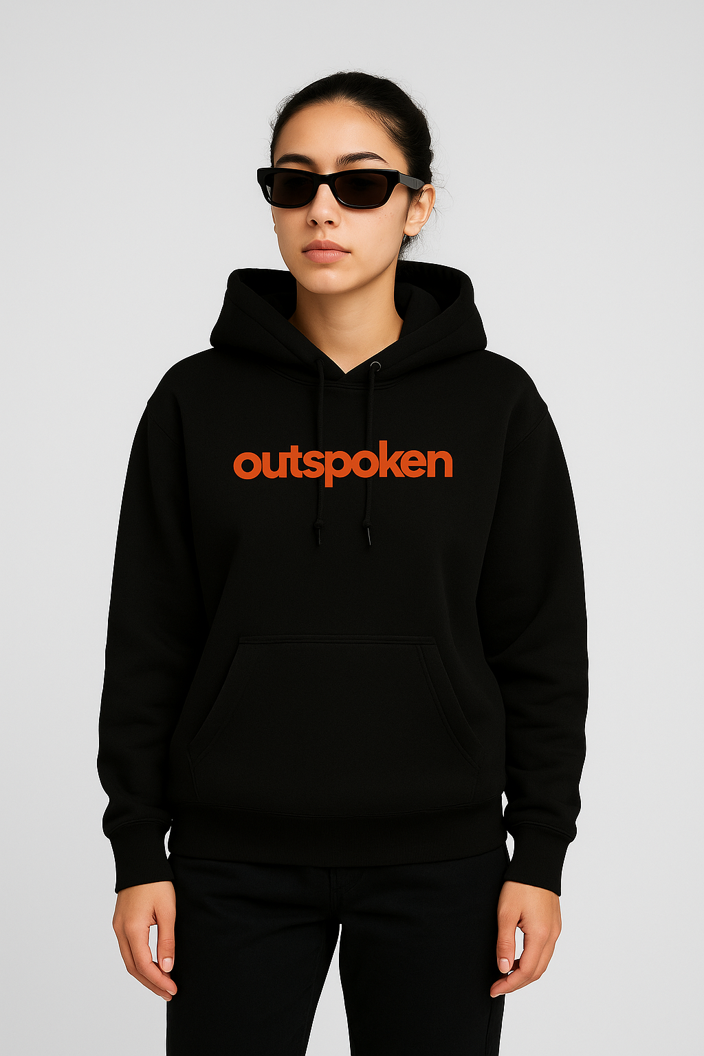 Young woman wearing black outspoken hoodie and sunglasses representing Bollywood fashion influencers style