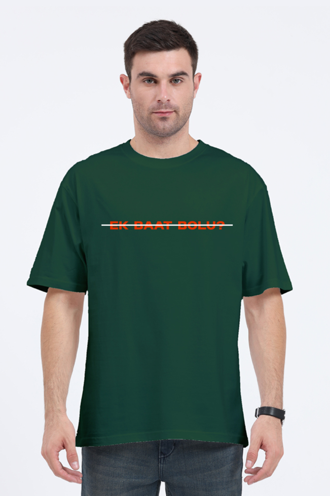 Outspoken Ek Baat Bolu oversized t-shirt in dark green with orange text worn by a male model