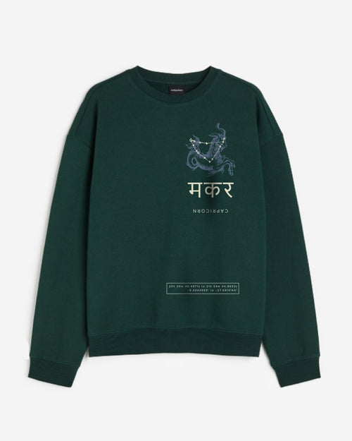 Outspoken dark green astrology graphic crewneck sweatshirt with Capricorn zodiac design and text