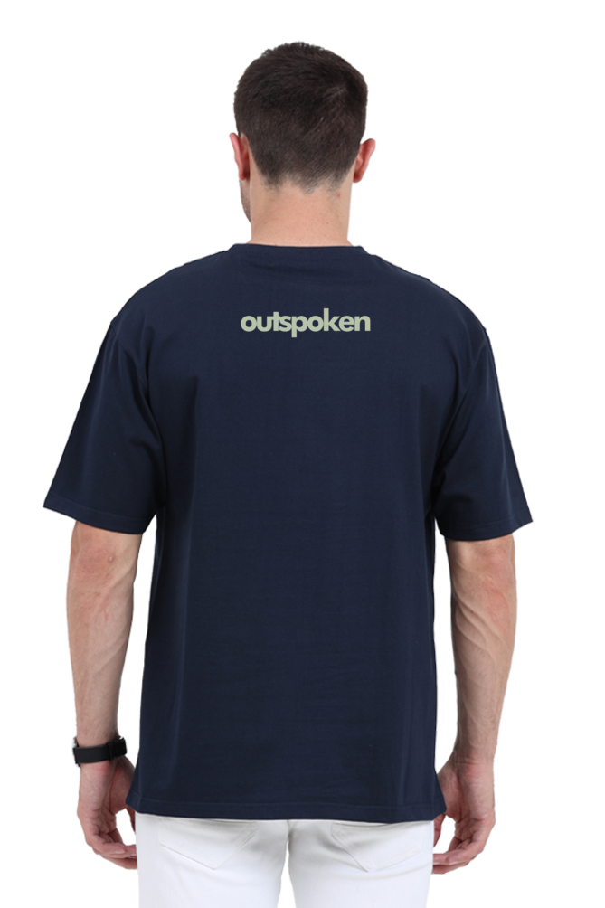 Back view of navy blue Khalsa oversize t-shirt by Outspoken worn by a man with white pants